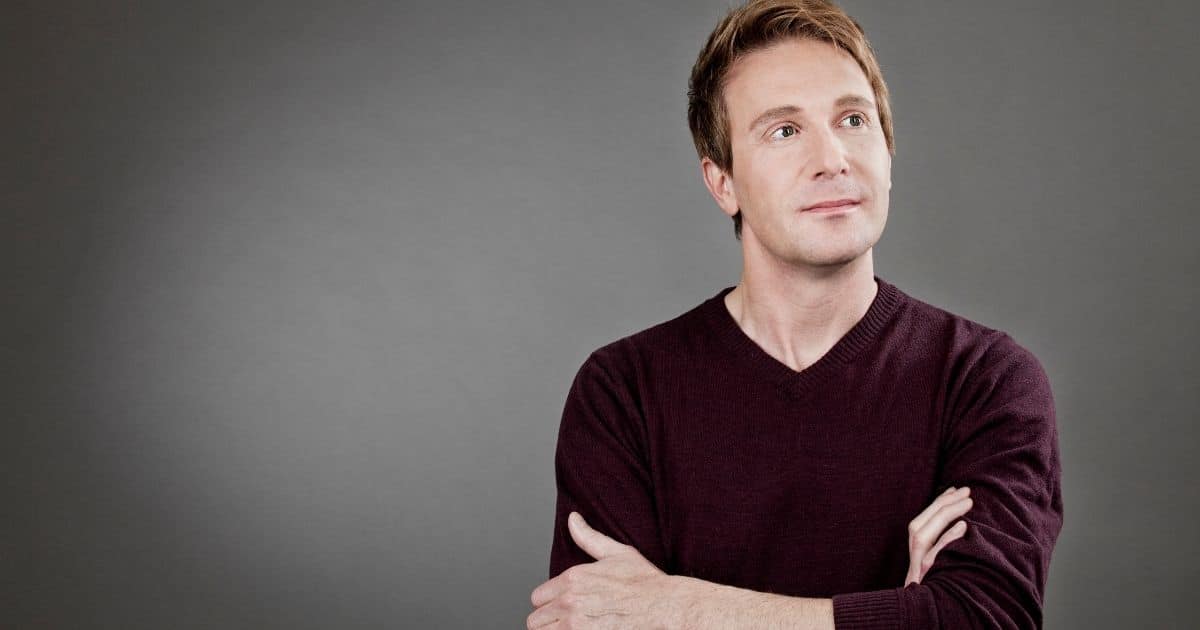 Young man portrait with arms crossed