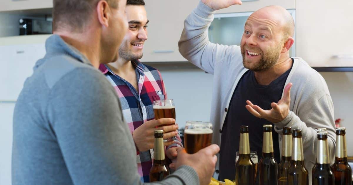 Men talking together at a bar