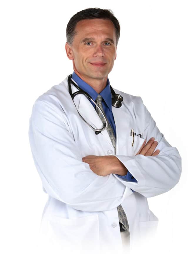 Doctor standing with arms crossed