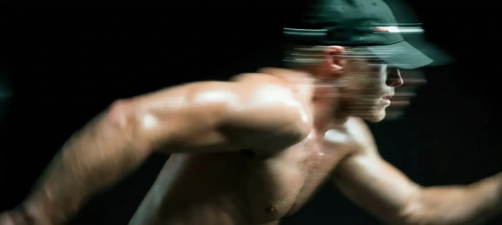 Athletic man in motion after testosterone replacement therapy at Mantality Health