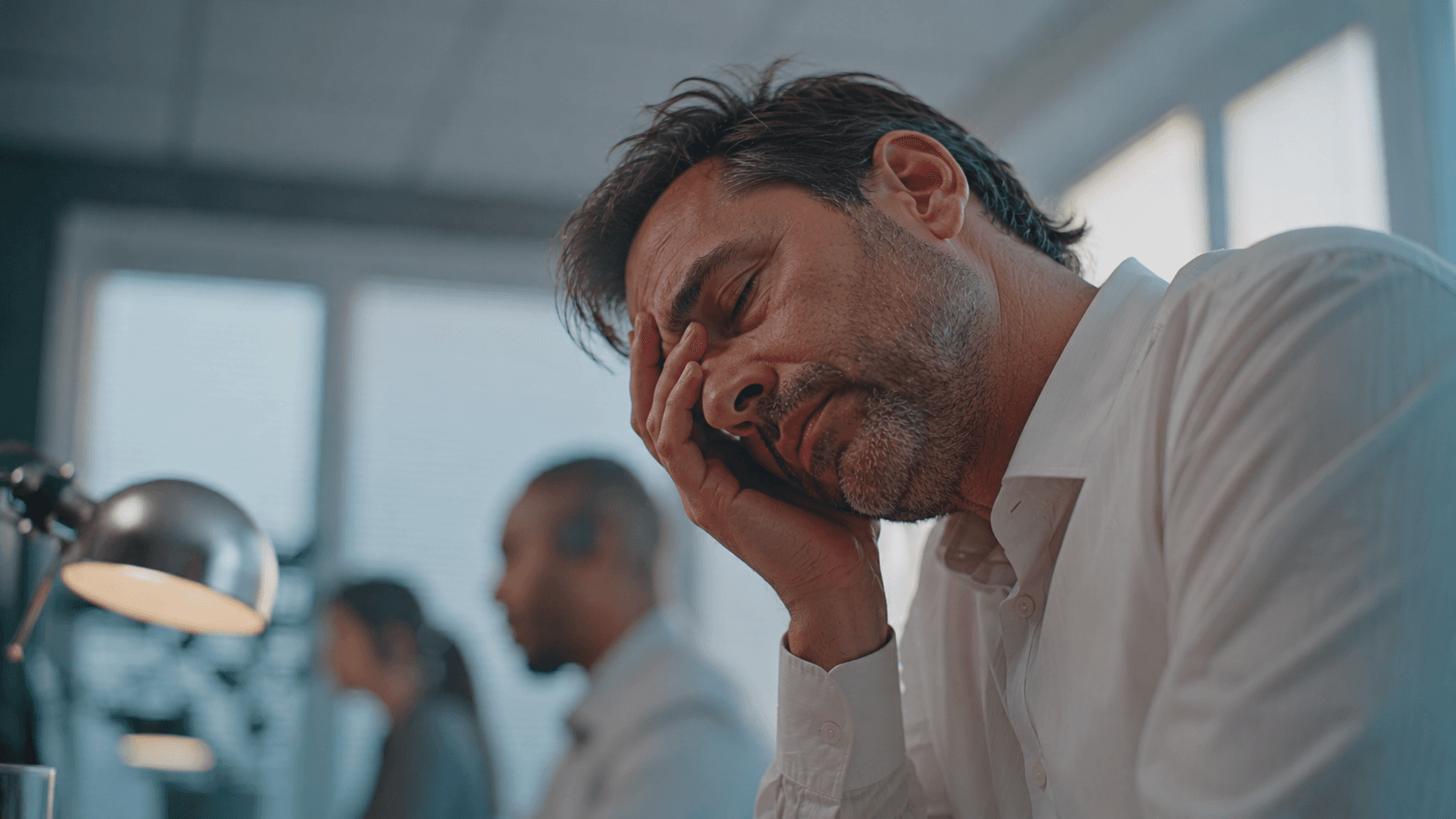 Man struggling with poor focus at work