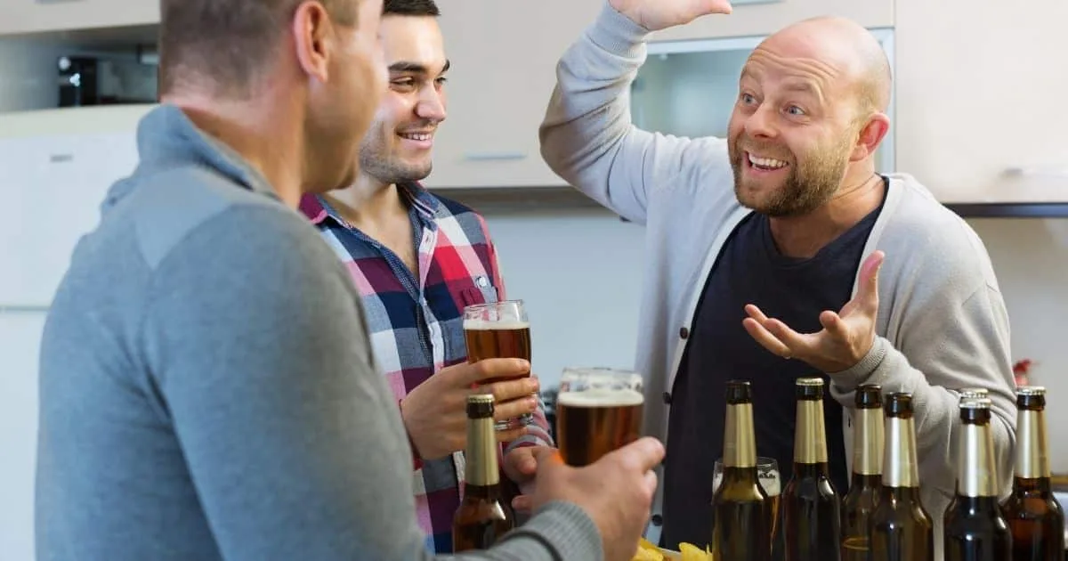 Men talking together at a bar