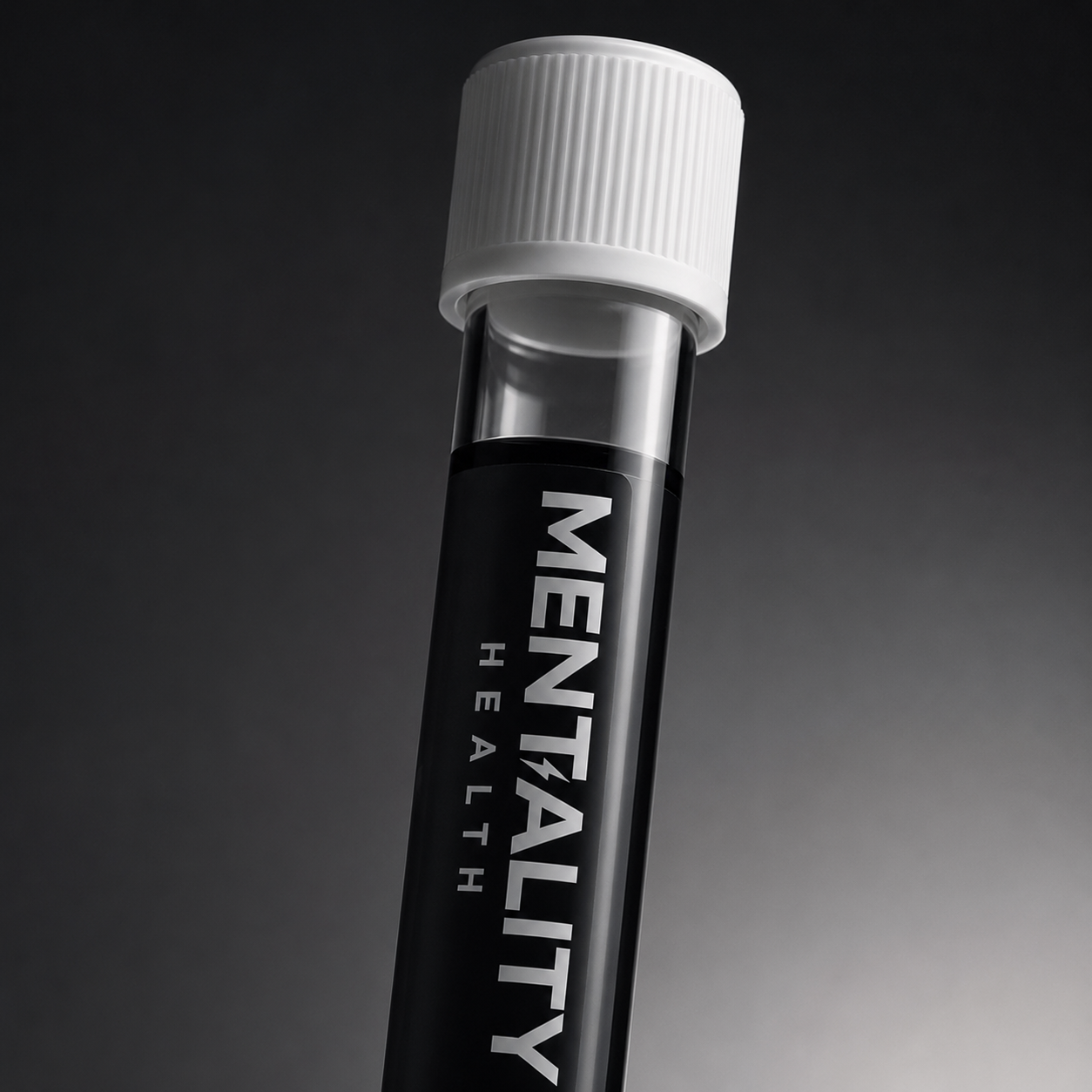 Mantality Health treatment vial on dark background