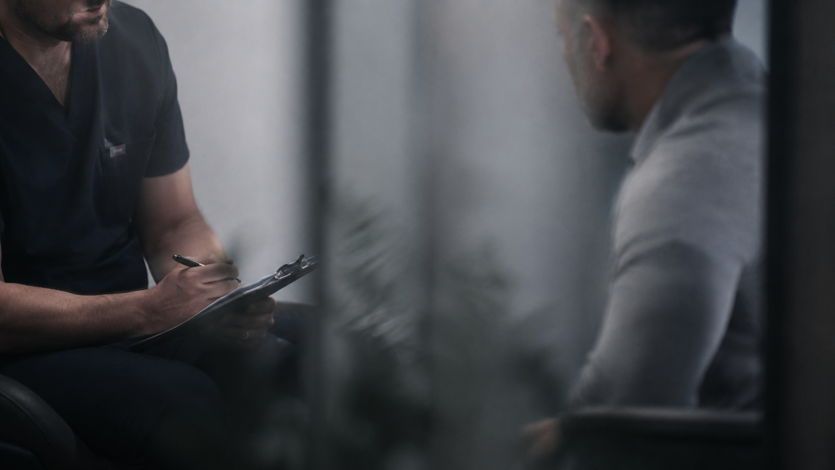 Physician consulting with a patient