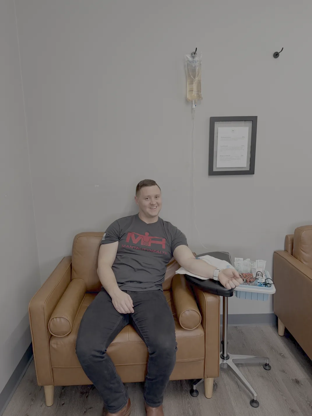 Mantality patient receiving IV infusion therapy