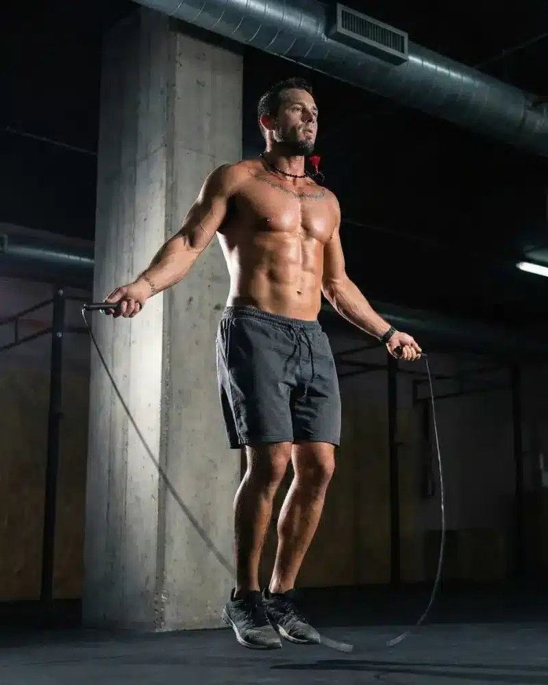 Man exercising with jump rope for fitness
